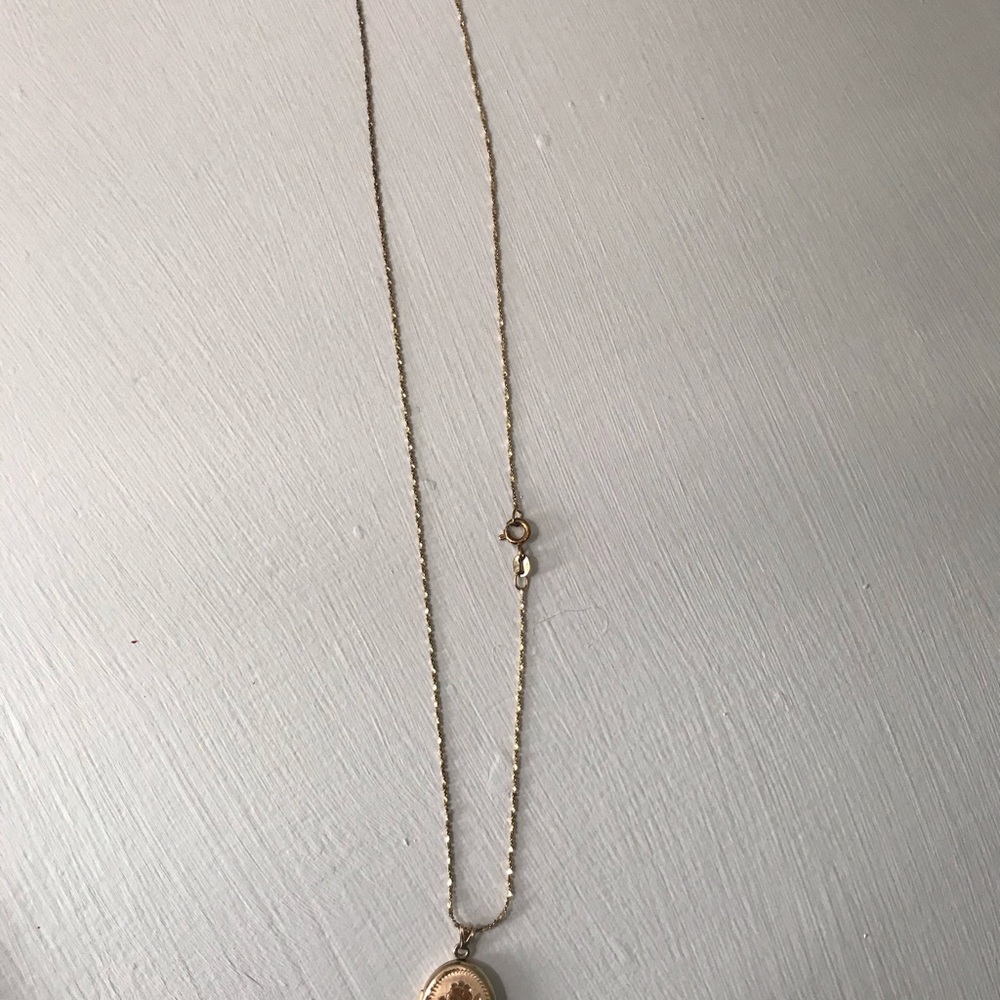 Locket with rose design non rust